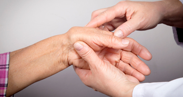 Image of hand to reflect a trigger finger